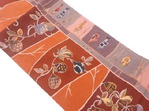 縮緬地金彩果実に魚模様名古屋帯